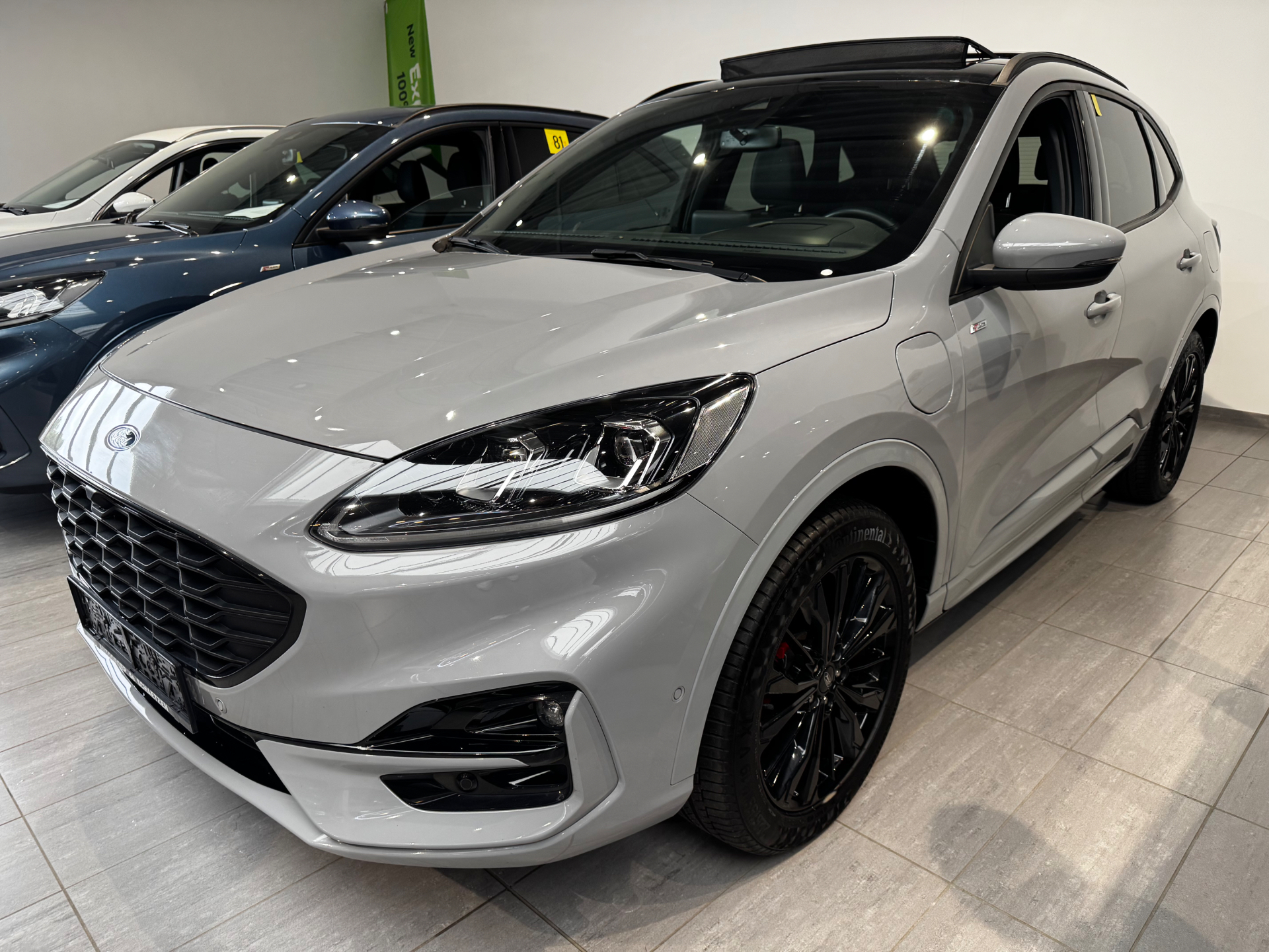Ford Kuga ST-Line X Graphite Tech Edition   Pano Dak / 19″ zwarte AluVelgen / Winter Pack / Driver Ass Pack / Tech Pack / Afn Trekhaak / Pano Dak